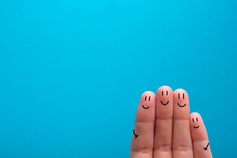 four smiling fingers that are very happy to be friends, family concept