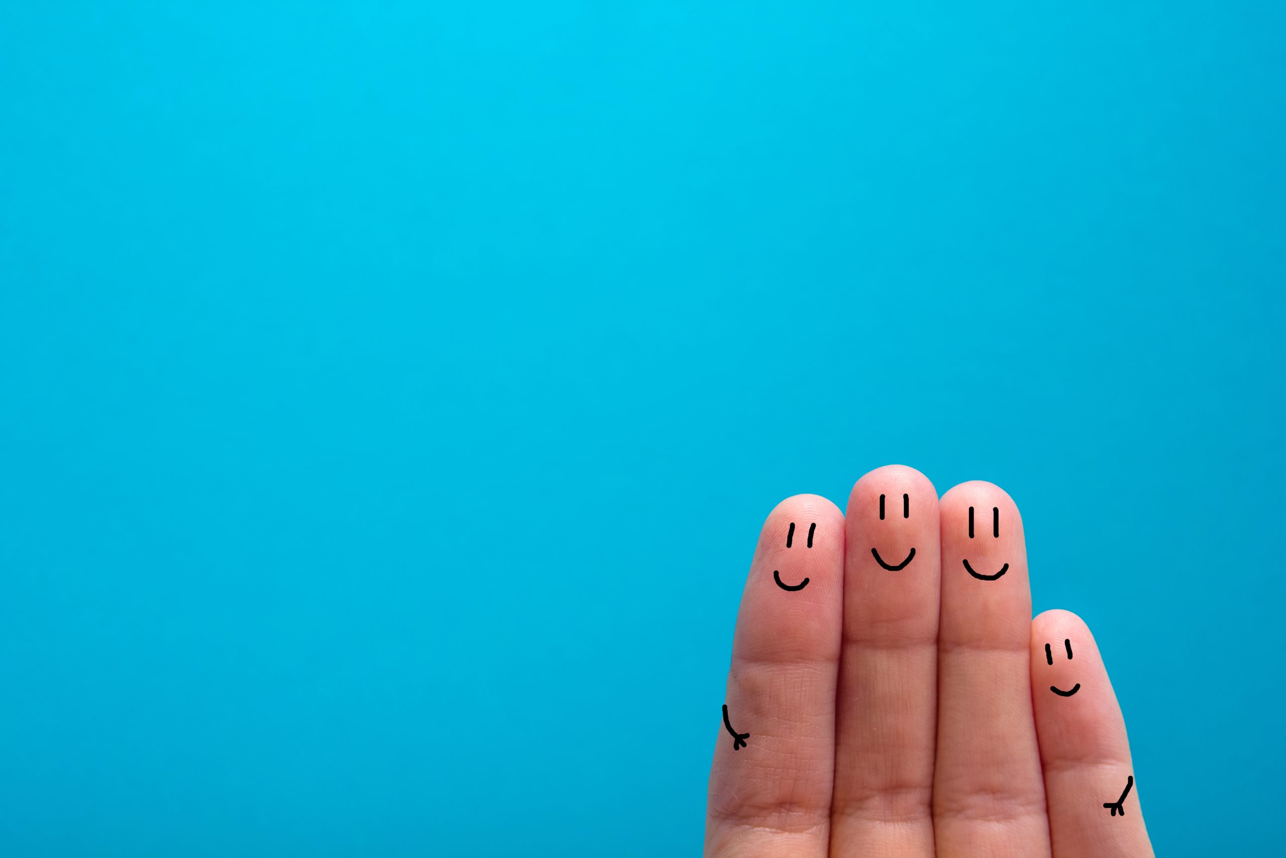 four smiling fingers that are very happy to be friends, family concept